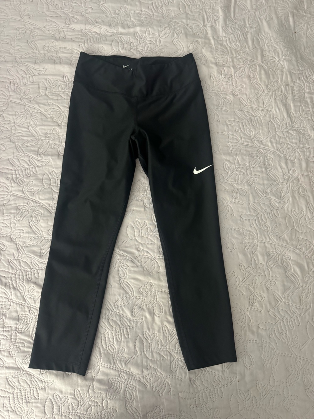 Nike Black Capri Leggings with White Swoosh Accent
